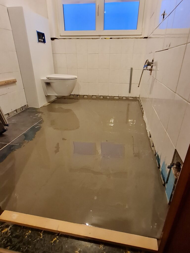 Badkamer voor en na 2.03
