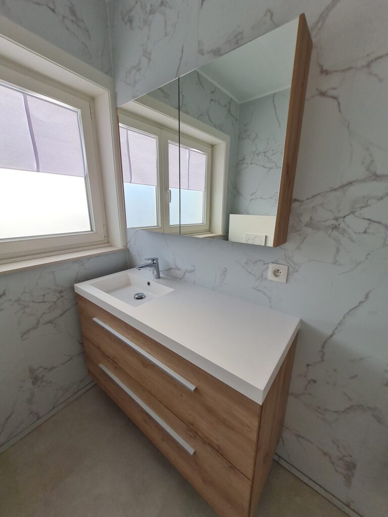 Badkamer voor en na 2.14